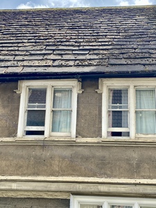 Very long Forest Marble Sandstone roofing tile in Bruton