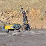 Drilling rows of holes for explosives - the machine is controlled remotely